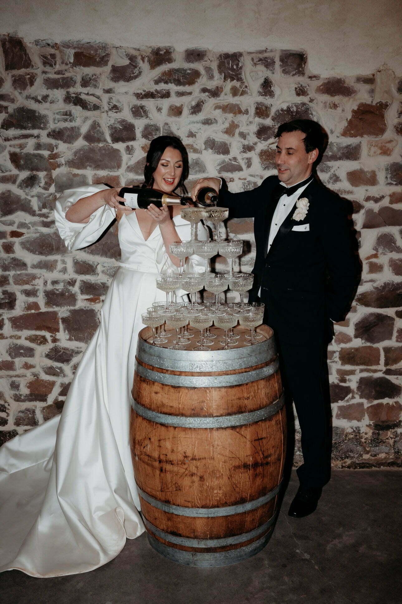 A top tip for a perfect champagne tower wedding photograph is to speak to your photographer to help choose the best place for your champagne tower